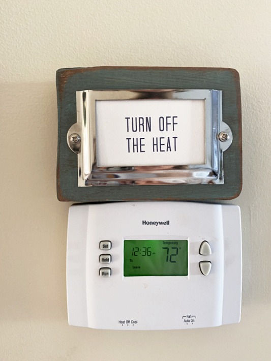 turn off the heat sign on thermostat