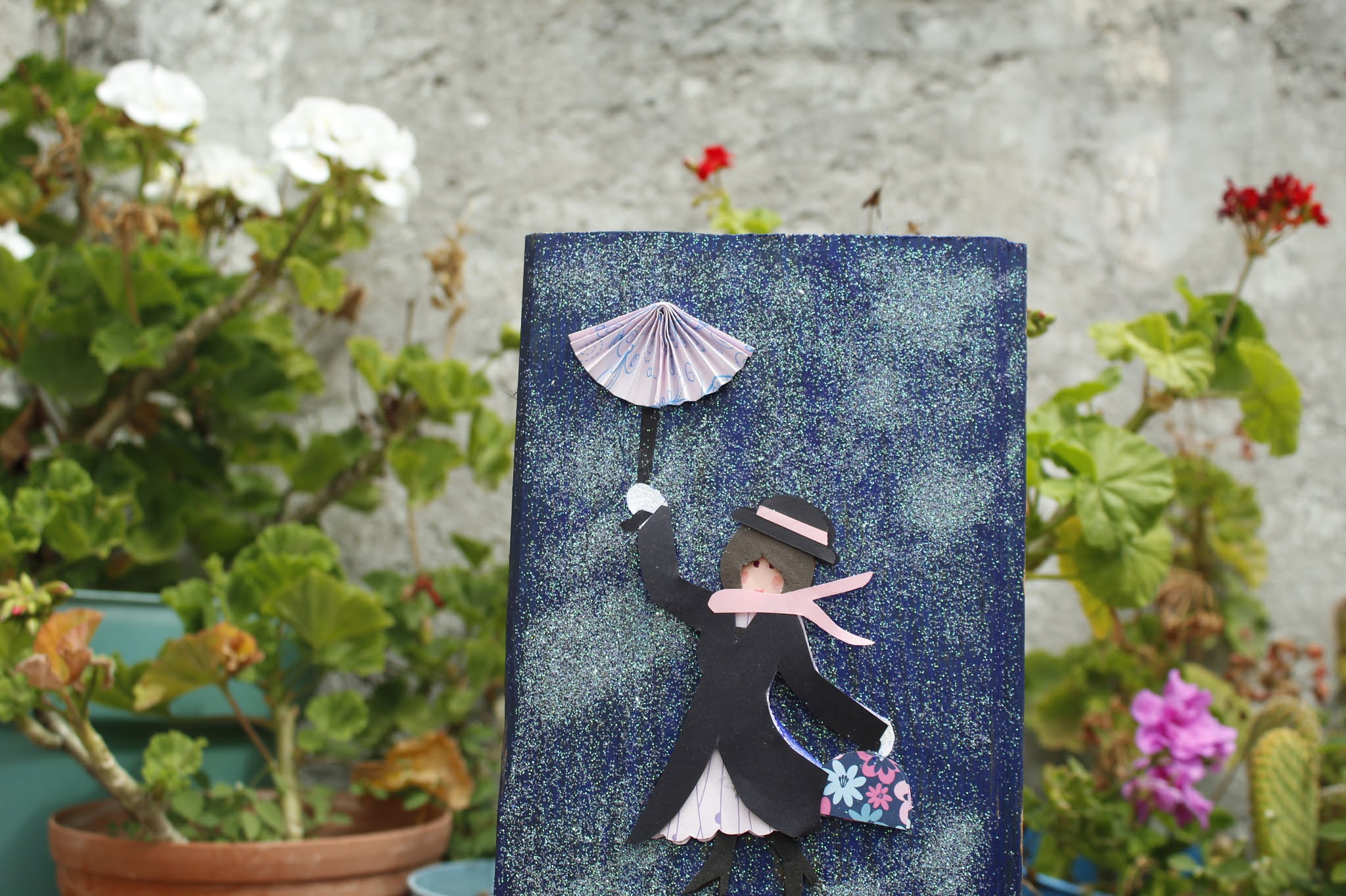 muñeca con sombrilla