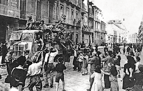 Neapolitans welcome the arrival of Allied troops in the city following the four-day uprising