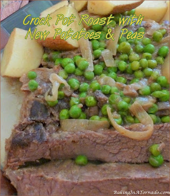 Crock Pot Roast with New Potatoes and Peas. The roast is slow cooked in a creamy onion sauce, add potatoes and peas and dinner is done. | Recipe developed by www.BakingInATornado.com | #recipe #dinner