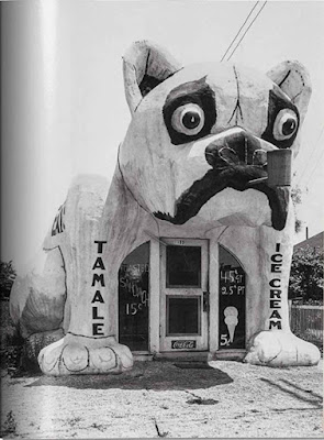 A black-and-white photo showing a head-on view of the bulldog building. The photo looks to have been scanned out of a book.