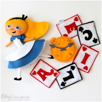 Alice, the cards and a clock. Custom name banner for the nursery