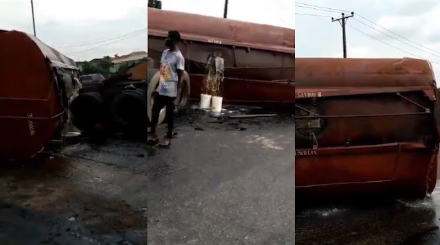 Tanker filled with diesel falls on Otedola bridge, spills content across the road (photos/video)