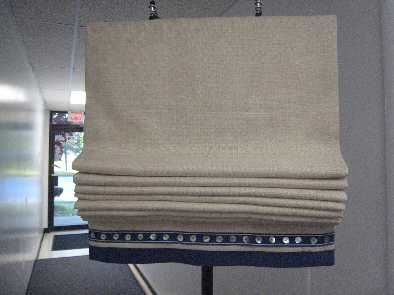 Leatherwood Design Co: Bottom trim on Roman shades