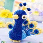 http://www.topcrochetpatterns.com/images/uploads/pattern/Prince_the_peacock_by_Janine_Holmes.pdf