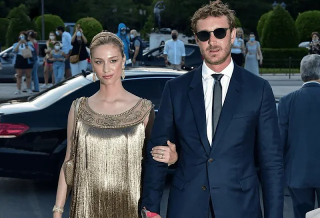 Beatrice Borromeo wore a golden fringed gown and headpiece from Christian Dior. Buccellati Milan earrings and bracelet