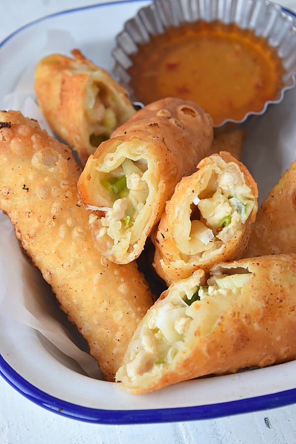 Takeout style Chicken Jalapeno Popper Egg Roll in a white bowl
