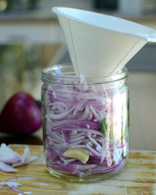 Spiced Pickled Red Onions ♥ KitchenParade.com, a game changer for tacos, salads, eggs and more.