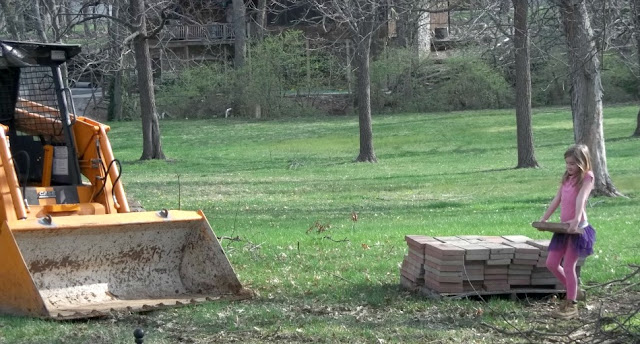 Construction of the chicken coop begins.