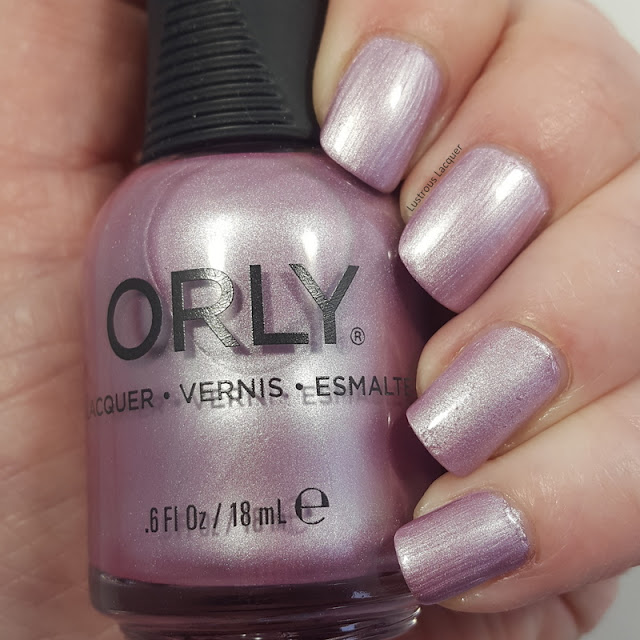 Icy Pink nail polish with a purple undertone and a pearl finish from the Pastel City Collection