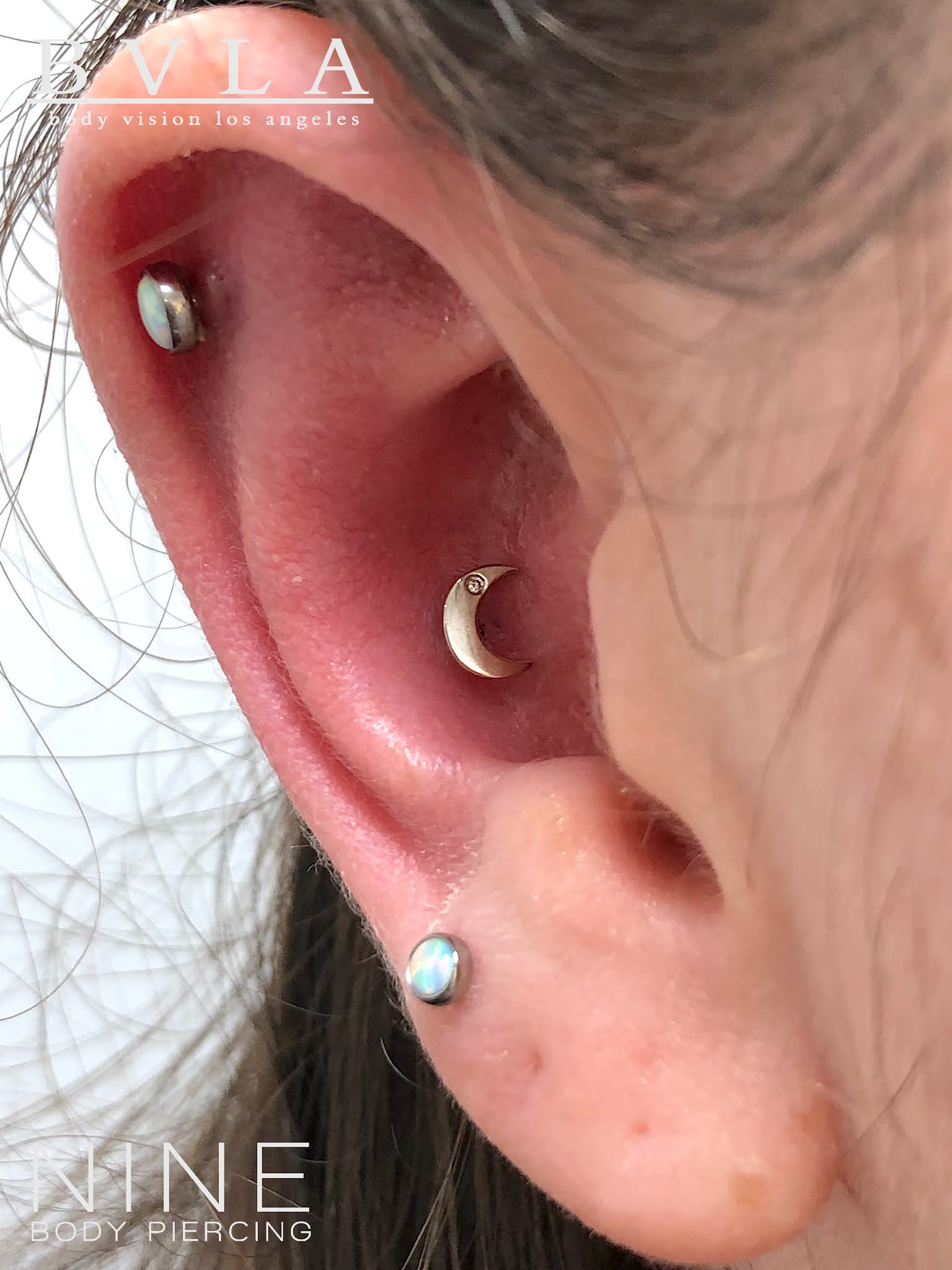 NINE BODY PIERCING BLOG Conch with White Gold Crescent Moon Diamond