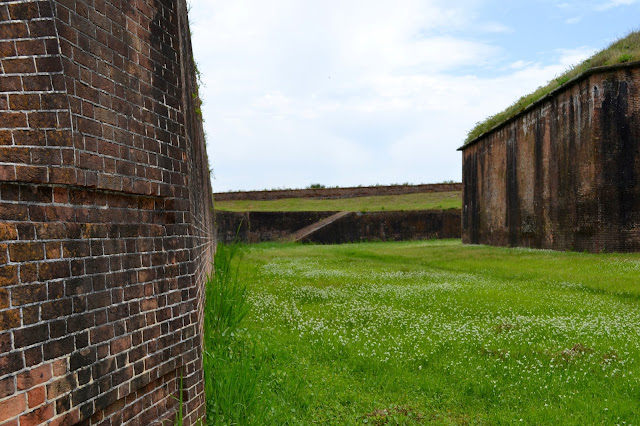 Fort Morgan- the area between the outer and inner walls of the fort