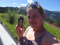 happy woman with focus tablets in sun