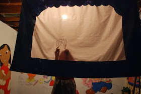 shadow puppet theater old sheet