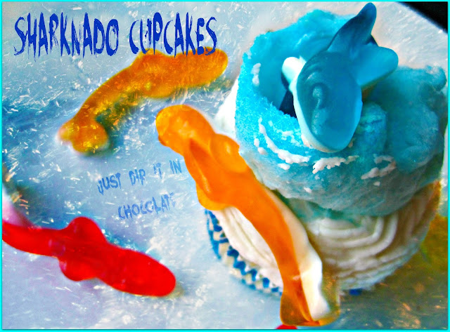 Shark Week "Sharknado" Cupcakes Recipe, take a bite out of Shark Week with these airy and delicious cupcakes! Filled with Very Berry "Blood" they are sure to be a hit, just like the movie, when served in a fun Luau, Halloween Party or just a fun gathering !