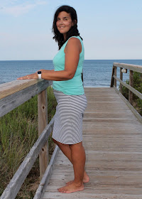 DIY striped knit skirt and v-neck tank top on the beach.