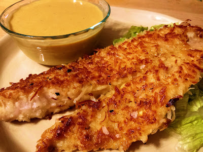 Pan fried coconut encrusted walleye fillets with honey vinaigrette style dipping sauce.