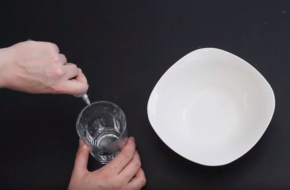 She Puts Superglue On A Cup From The Dollar Tree And Sticks It To A