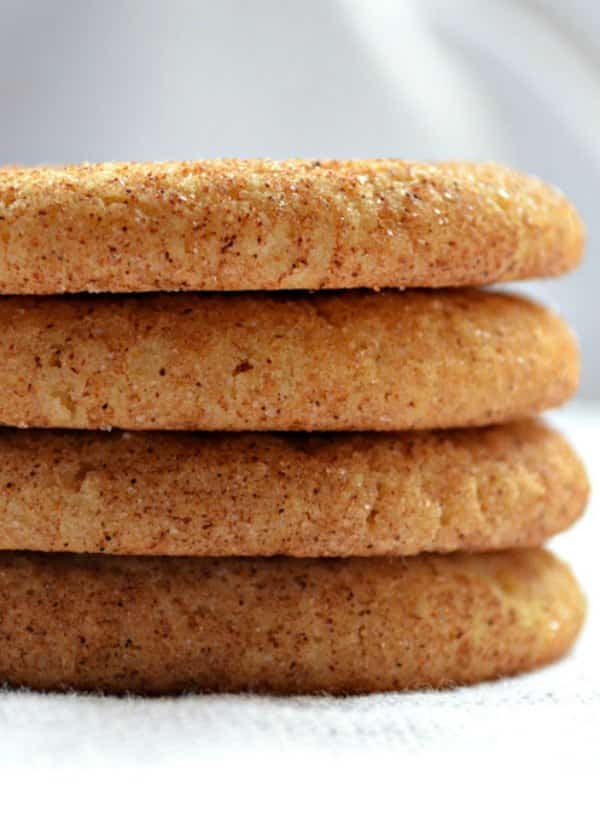 A stack of Brown Butter Snickerdoodles Cookies. A favorite Christmas Cookie recipe with a delicious cinnamon sugar coating from Serena Bakes Simply From Scratch. 