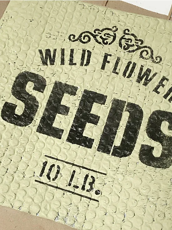 old sign stencil wild flower seeds