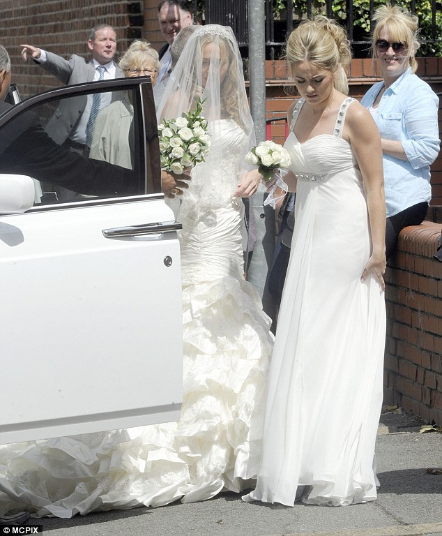 Don't upstage the bride! Coleen Rooney looks lovely in lace at family ...