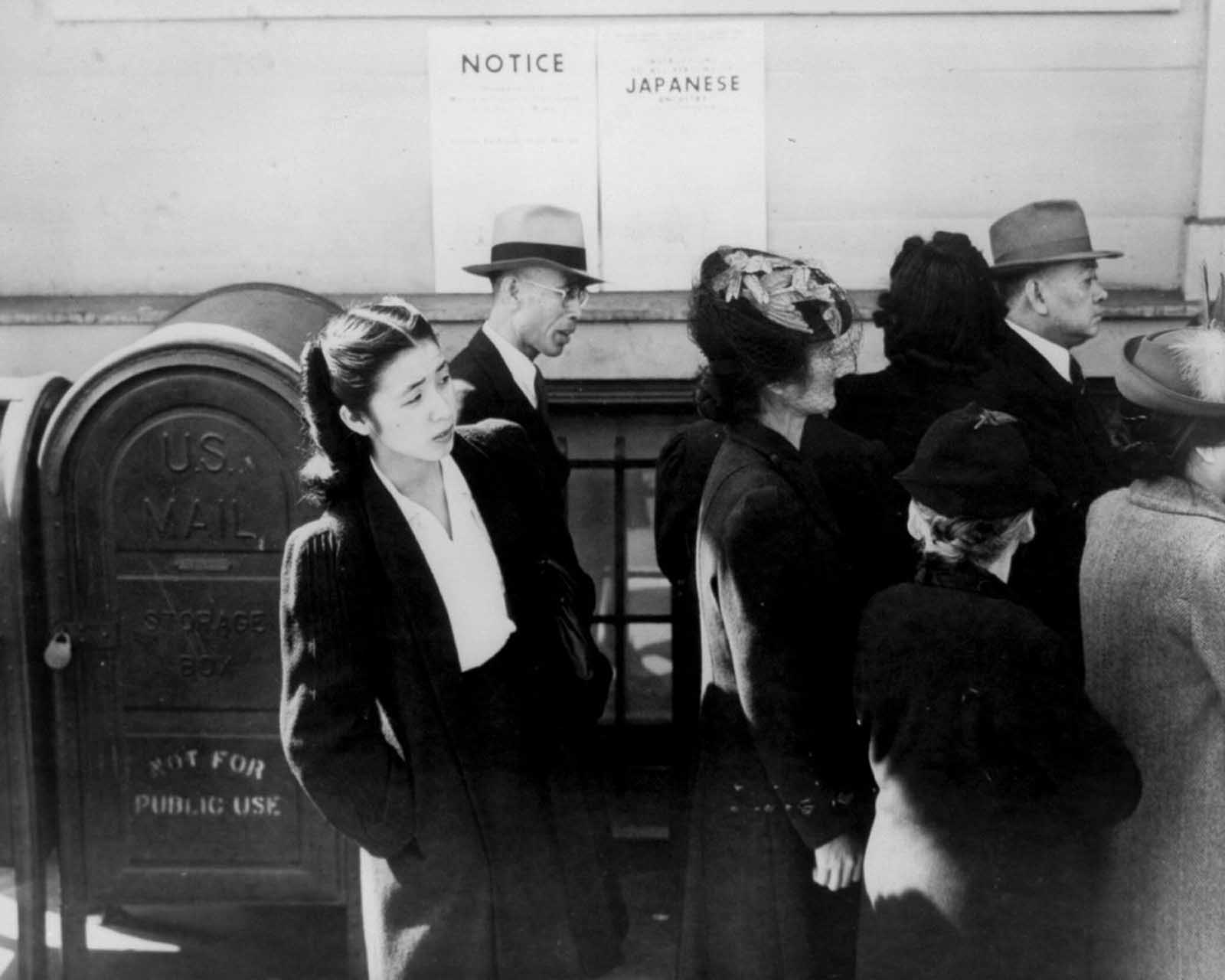 Japanese-Americans in San Francisco line up to register for evacuation and housing.