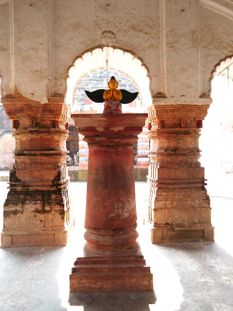 Garuda on a pillar inside the Lalaji Temple, Kalna Rajbari Temple complex, West Bengal