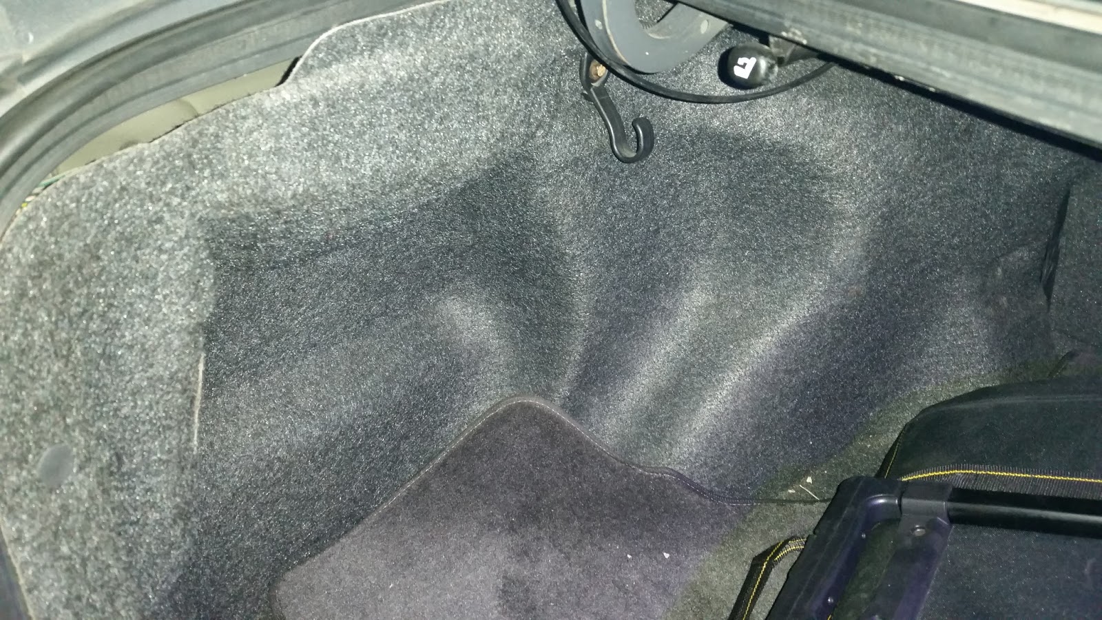 I don't know why mine was missing a piece but as I did for the trunk light I traced my rear back up light wire to this opened end box .