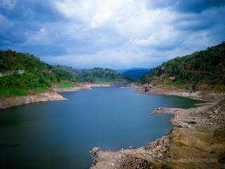 Peaceful Scenery Of Dam Landscape Between The Hills In The Sunny Cloudy Day At Titab Ularan Village North Bali Indonesia