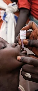 Child given an oral polio vaccine in South Sudan