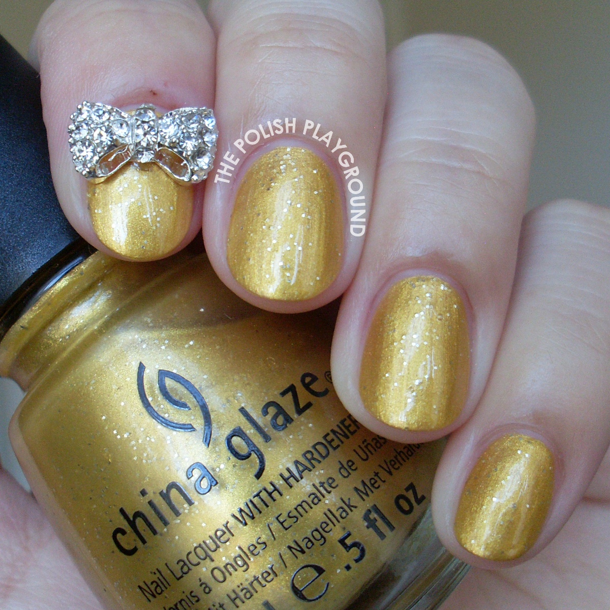 China Glaze Champagne Bubbles with Bow Stud Accent Nail Art