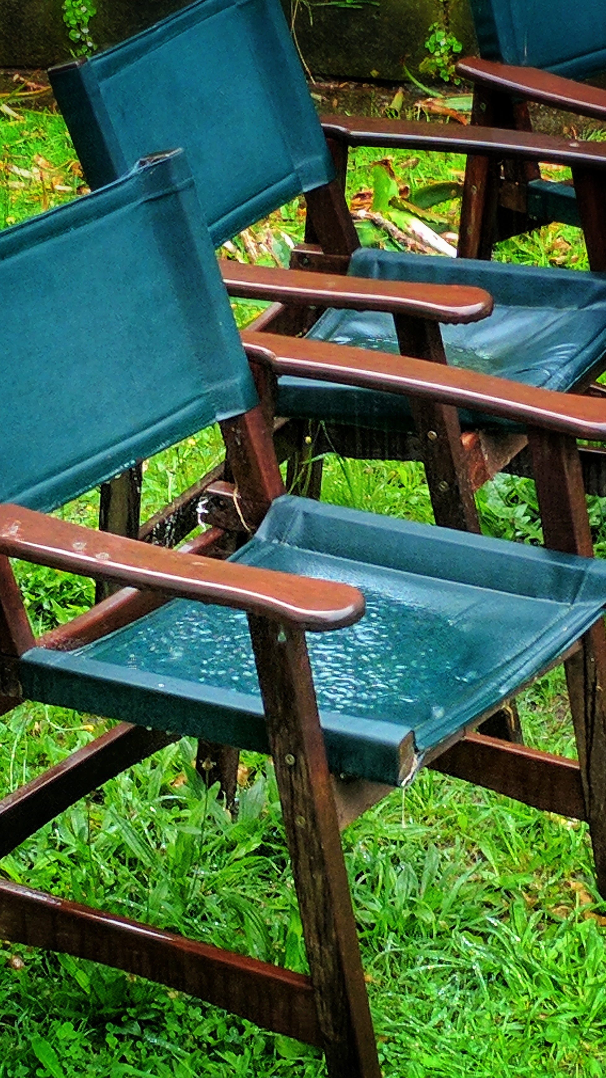 Summer rain on outdoor chairs