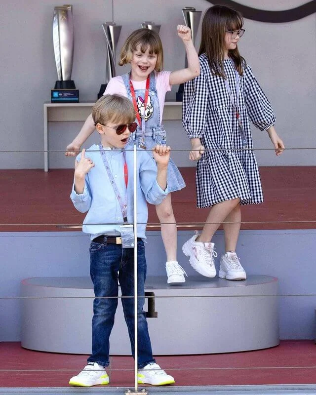 Princess Gabriella wore a blue denim daisy duck dress from Monnalisa. Prince Jacques, Pierre Casiraghi and Kaia Rose Wittstock