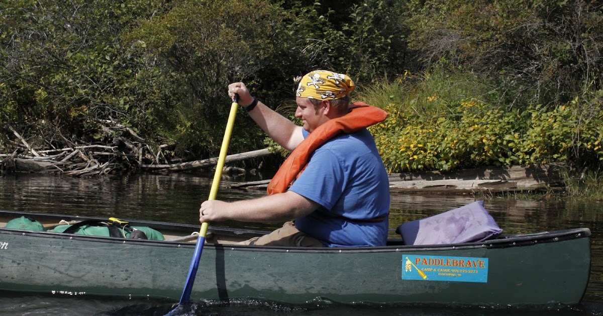 Lacing up my hiking boots Canoeing the Au Sable River is always better