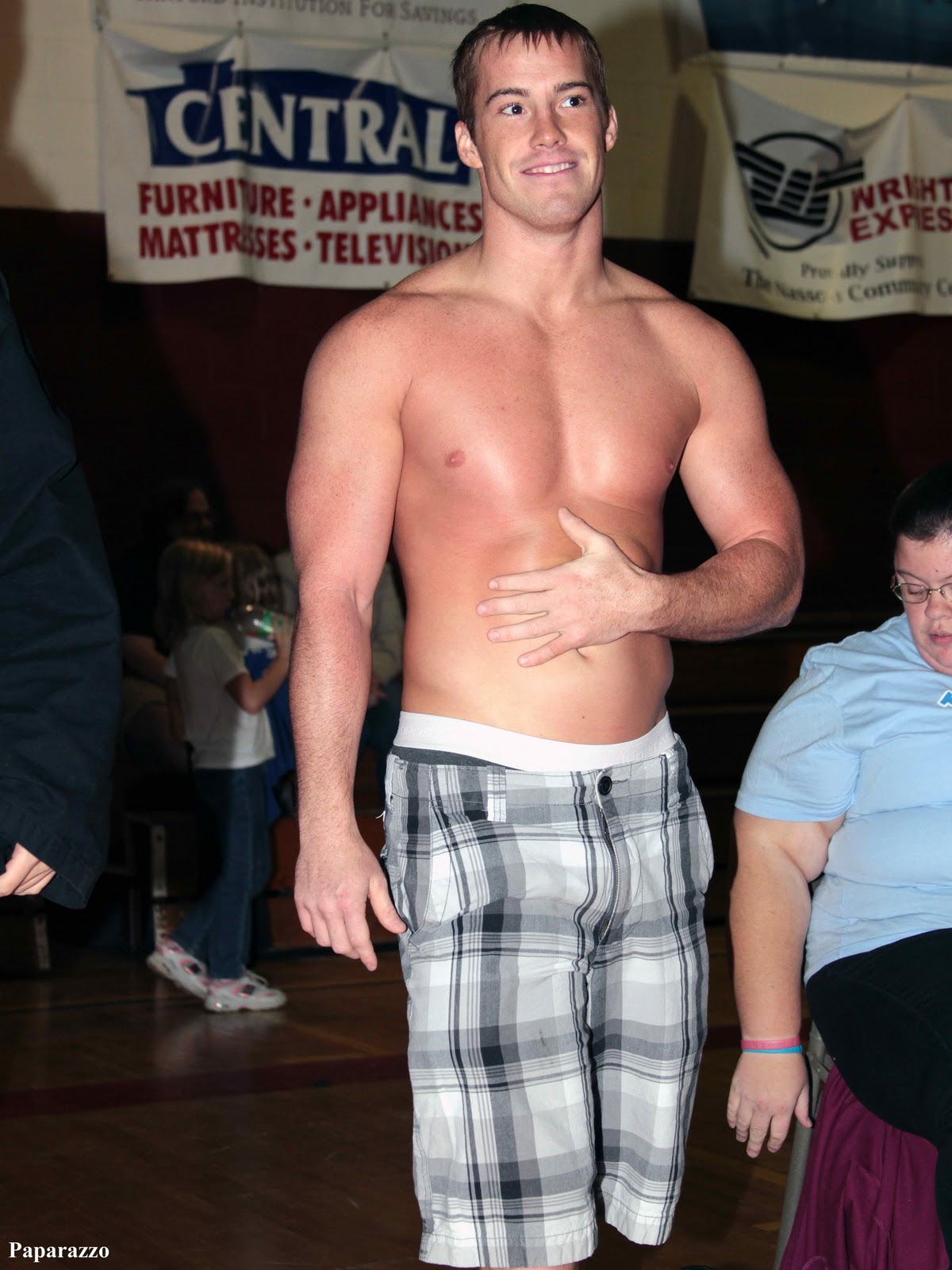 wrestler Cameron Matthews stepping into the ring to referee an Independent Wrestling...