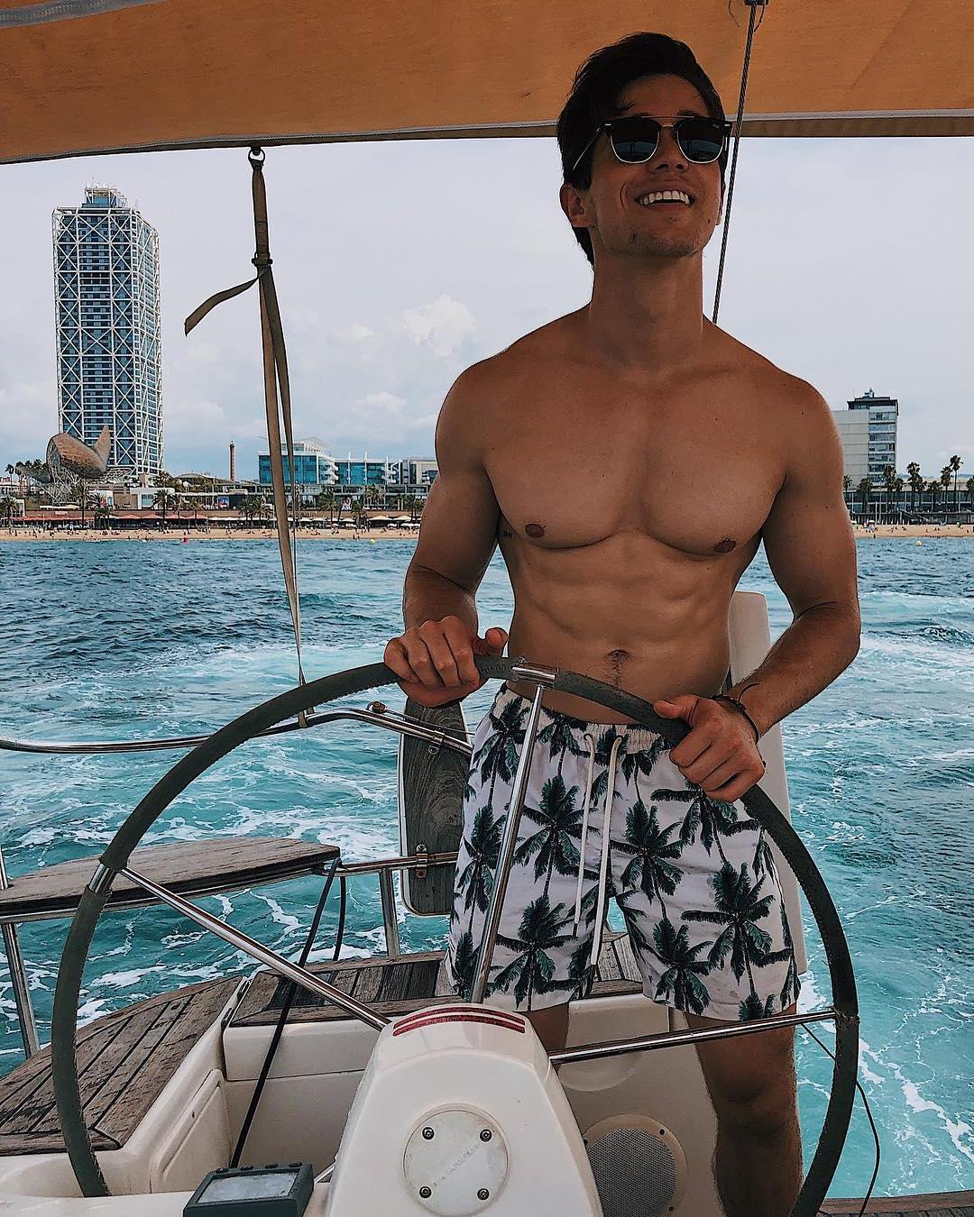 cute-bottom-gay-guys-smiling-fit-shirtless-summer-body-huge-pecs-vacation-boat-ride