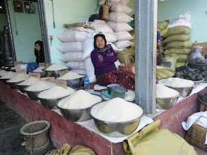 A rice seller in Tamu market in Myanmar