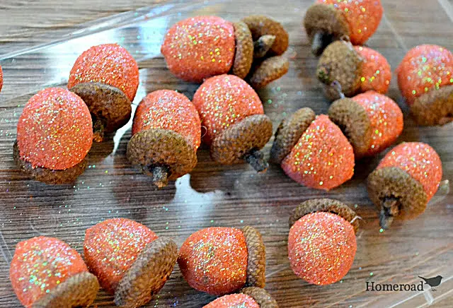 0range glittered acorns