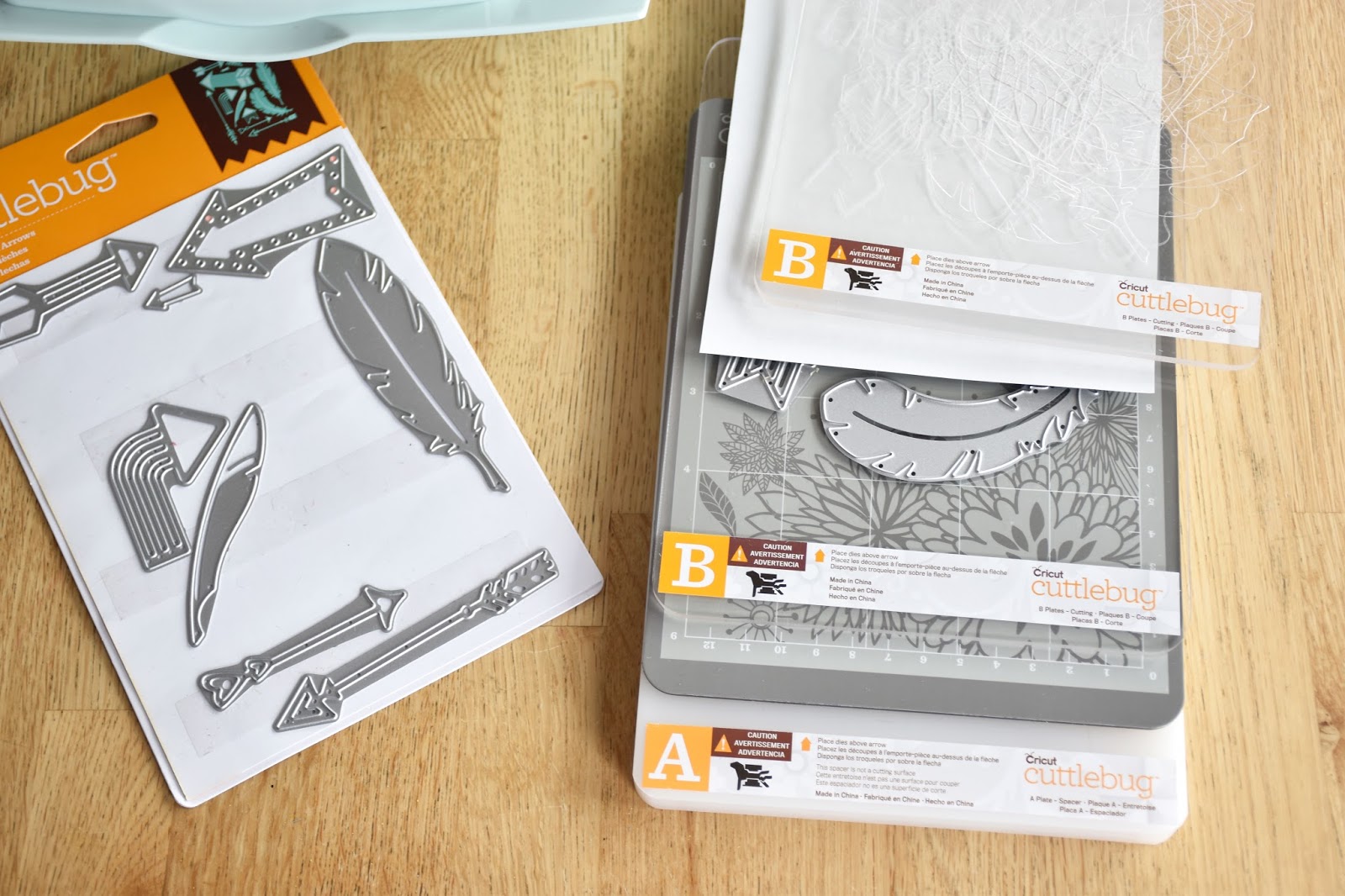 Woman in Real Life A DIY Cricut Cuttlebug Feather & Foliage Mobile