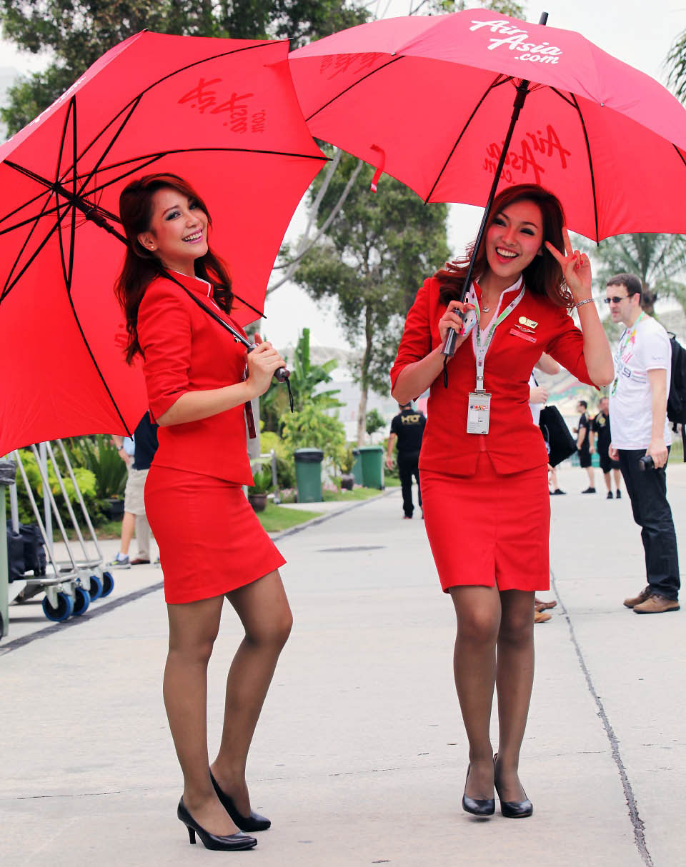 Interesting Green: Are AirAsia, Firefly stewardesses uniforms too sexy?