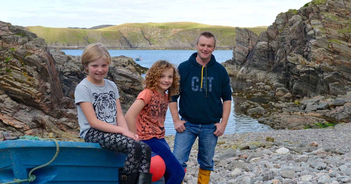 Hero Coastguard reunited with two young children he rescued after they