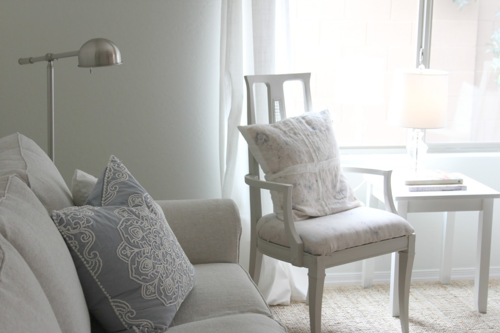 Serene neutral living and dining room decor DIY makeover on Hello Lovely Studio