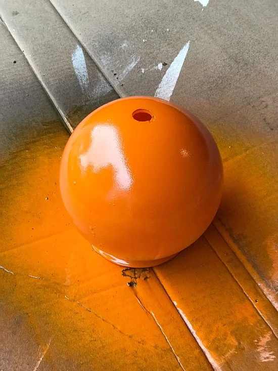 Spray Painted orange globe pumpkin