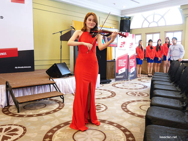 We were treated to a sweet violin performance by the lady in red at the launch event