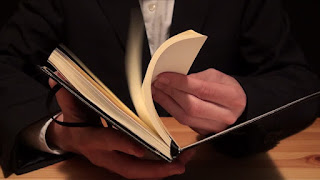 2 Businessman%2BOpening%2Ba%2BNotebook%2Band%2BStock%2BFootage%2BVideo%2B%2528100%2525%2BRoyalty free%2529%2B15234136%2BShutterstock