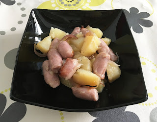 Casserole with sausages and potatoes in Crock Pot