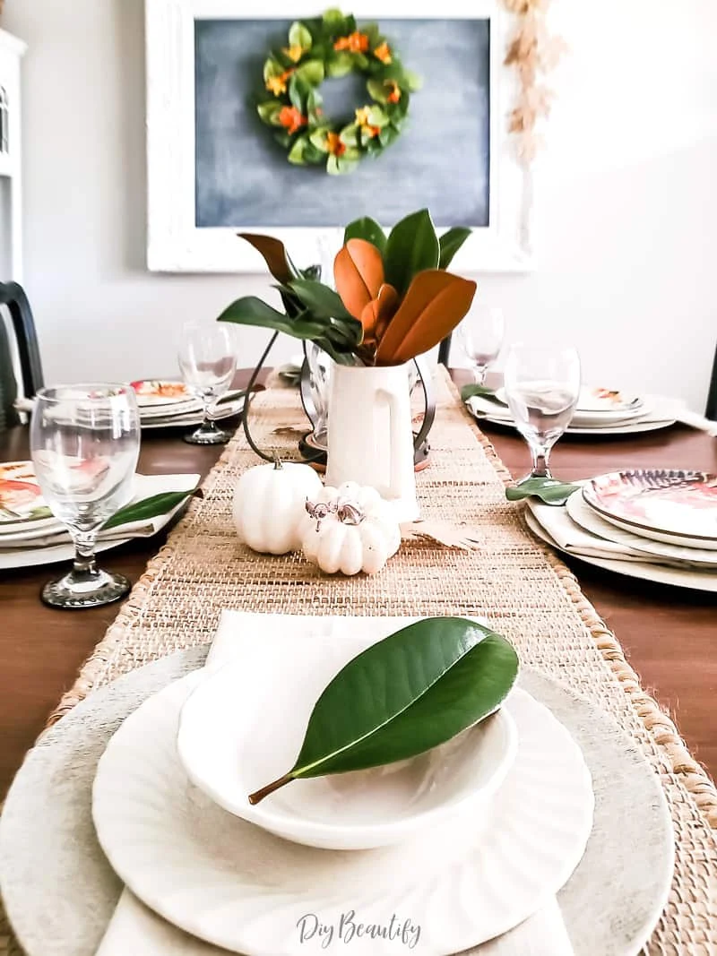 fall dining room with magnolia leaves