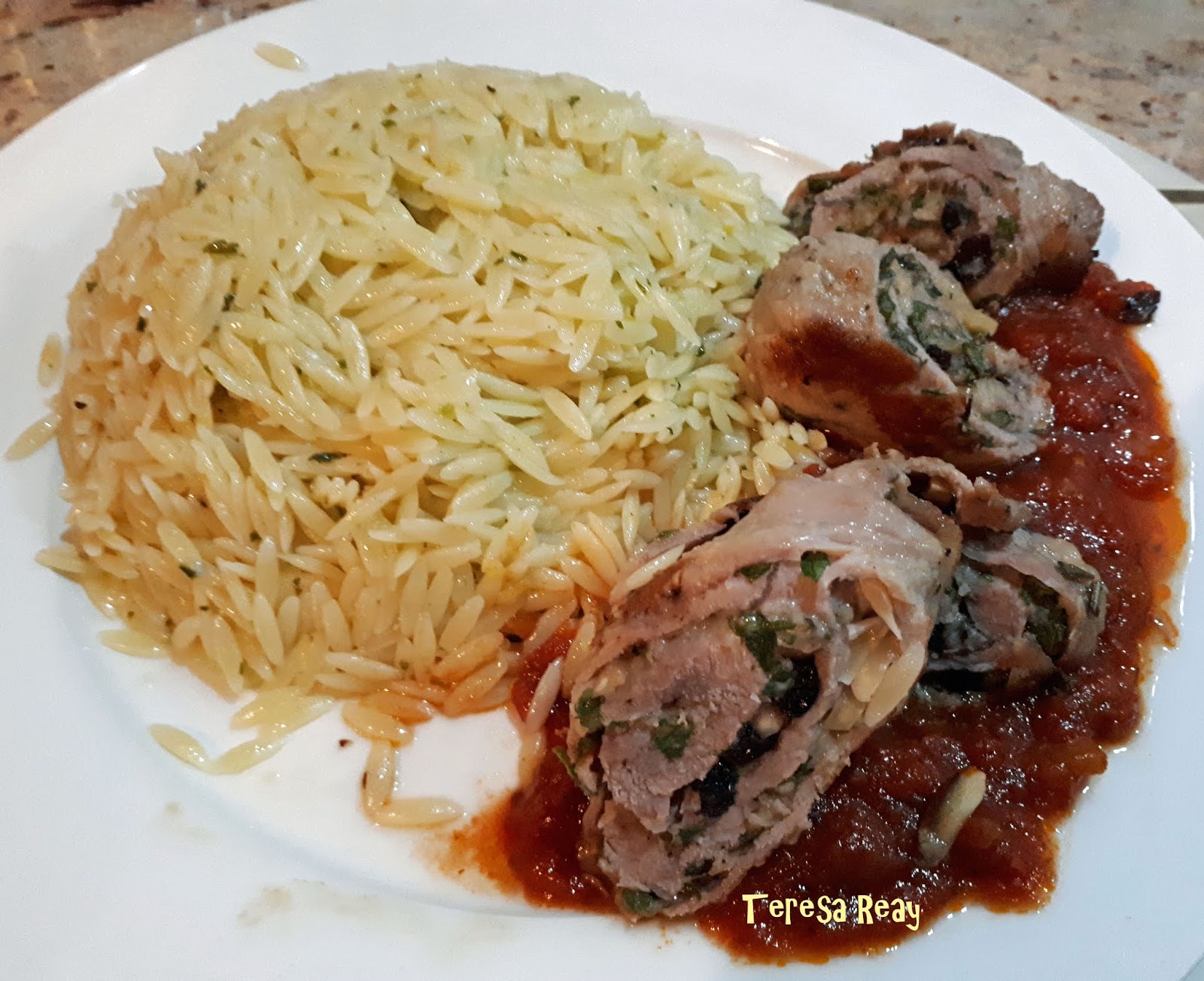 SICILIAN VEAL INVOLTINI WITH HERBED RISONI, ROAST TOMATO AND OREGANO SAUCE