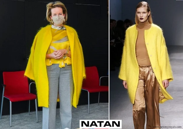 Queen Mathilde wore a yellow coat from Belgian designer Edouard Vermeulen of Natan