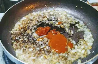 Cooking onion, ginger garlic,dark soya sauce, red chilly sauce for manchurian sauce